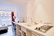 Chic Suisse Flat - Metro Louise Apartmán