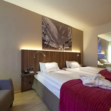 Schuman By Ihg Отель